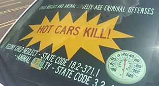 'Hot cars kill' windshield sign